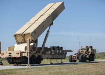 A U.S Army Soldier lifts the hydraulic launching system on the new Long-Range Hypersonic Weapon (LRHW) during Operation Thunderbolt Strike at Cape Canaveral Space Force Station, Florida, March 3, 2023. During the LRHW system development, the Army’s Rapid Capabilities & Critical Technologies Office (RCCTO) implemented a Soldier-centered design concept which uses formal and informal Soldier touch points to obtain early feedback to influence design, speed up development, and ensure an operationally effective weapon system. (Photo Credit: Spc. Chandler Coats, U.S. Army)
