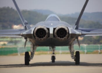 Back view of an air force KF-21 Boramae fighter plane parked on airstrip at Seoul Airport