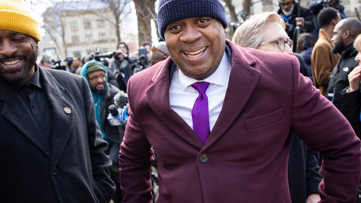 Ras Baraka in purple jacket