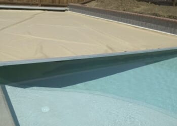 Homeowner uncovers pool for the summer and makes disturbingly gruesome find