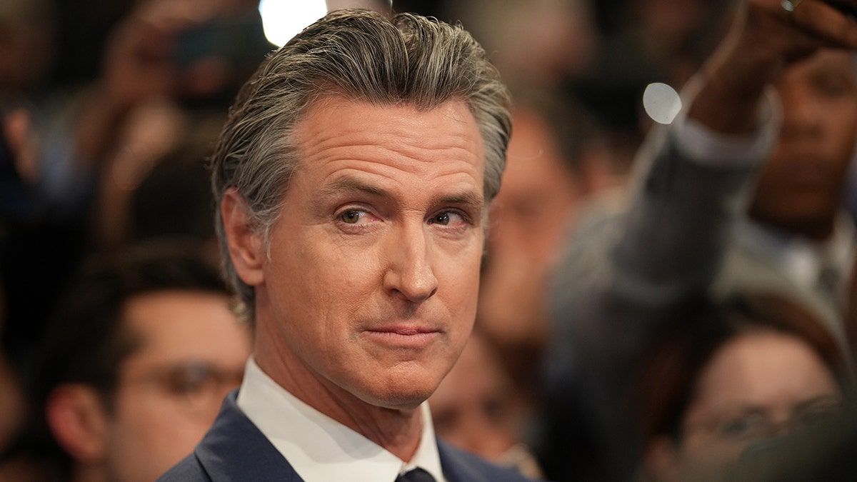 Gavin Newsom raising his eyebrow