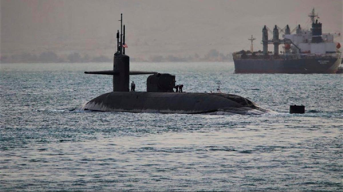 This photo released by the US Navy show a guided-missile submarine capable of carrying up to 154 Tomahawk missiles. The Navy said nuclear-powered submarine, based out of Kings Bay, Georgia, passed through the Suez Canal on Friday, April 7, 2023.