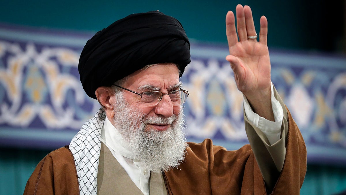 Iran's leader Khamenei waving to crowd