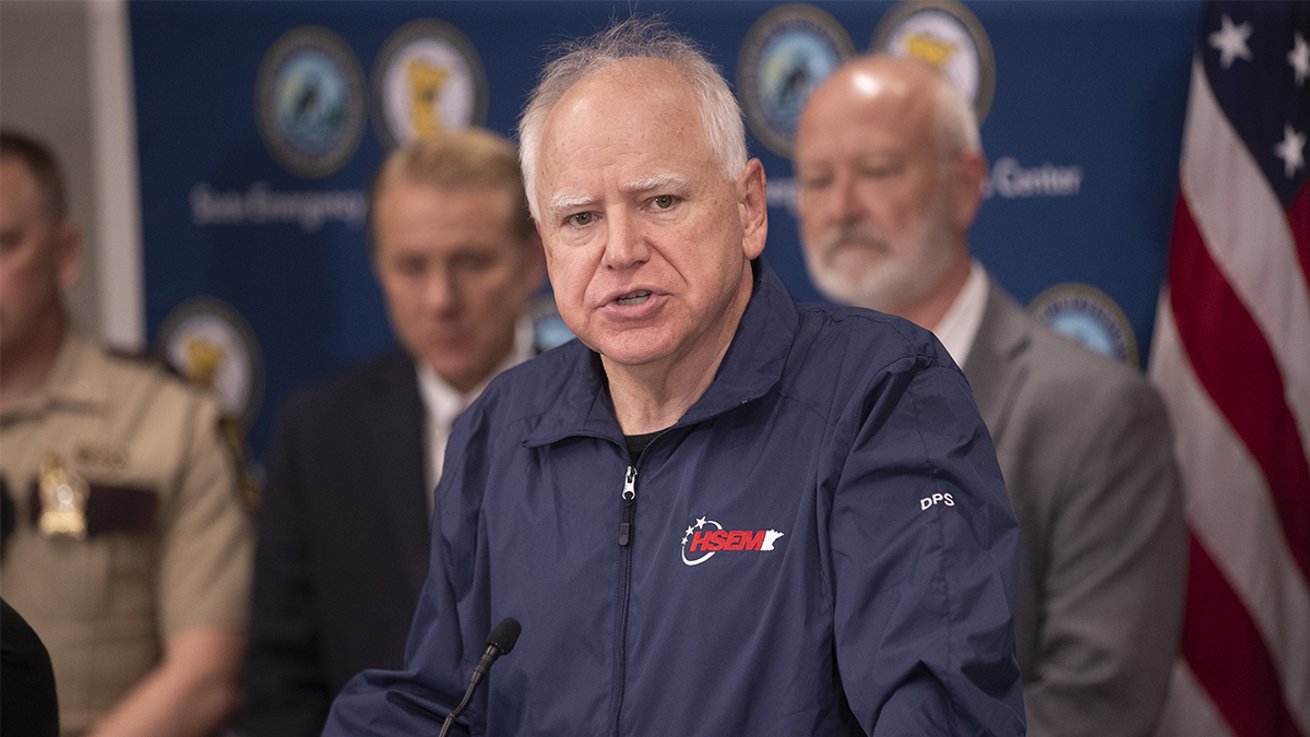 Gov. Tim Walz speaks at a press conference held at the Minnesota Emergency Management Center following the arrest of Vance Boelter.