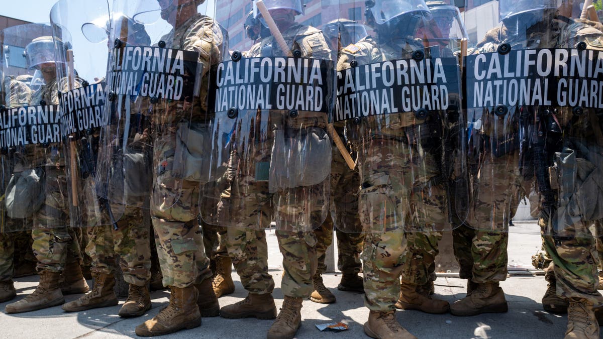 The National Guard stand outside of a downtown jail in Los Angeles following two days of clashes with police during a series of immigration raids on June 08, 2025 in Los Angeles, California. Tensions in the city remain high after the Trump administration called in the National Guard against the wishes of city leaders. (Photo by Spencer Platt/Getty Images)