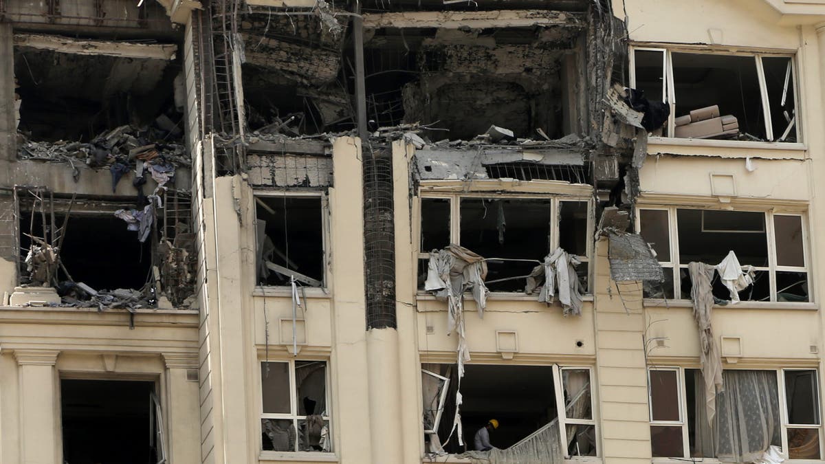 Buildings in residential areas across Tehran are damaged following Israeli strikes on Iran's nuclear and military facilities on June 13, 2025.