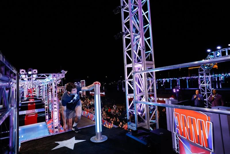 Austin Baron completes the "American Ninja Warrior" course and advances to the semifinals for Season 17. Credit: Photo courtesy of Trae Patton/NBC