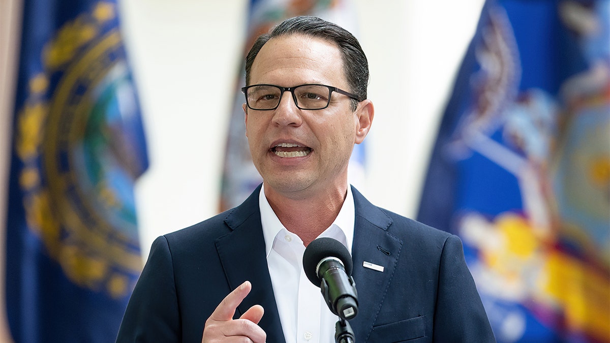 Josh Shapiro points while he is speaking