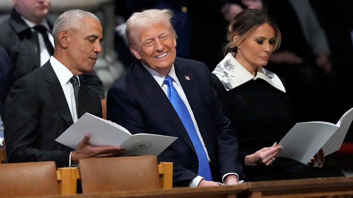 Obama and Trump at CArter funeral