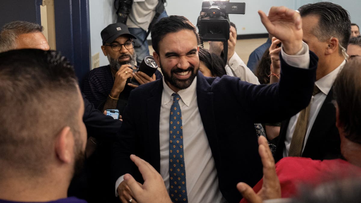 New York City mayoral candidate Zohran Mamdani is surrounded by supporters after a press conference with union leaders in New York City, on July 2, 2025. REUTERS/David 'Dee' Delgado