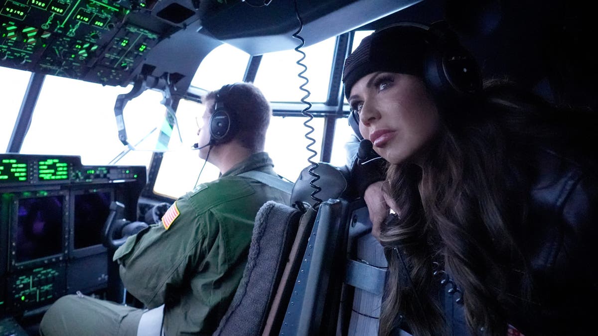 U.S. Homeland Security Secretary Kristi Noem looks out during an aerial tour on a HC-130J from U.S. Coast Guard Air Station Kodiak, Monday, March 17, 2025, in Kodiak, Alaska, U.S.