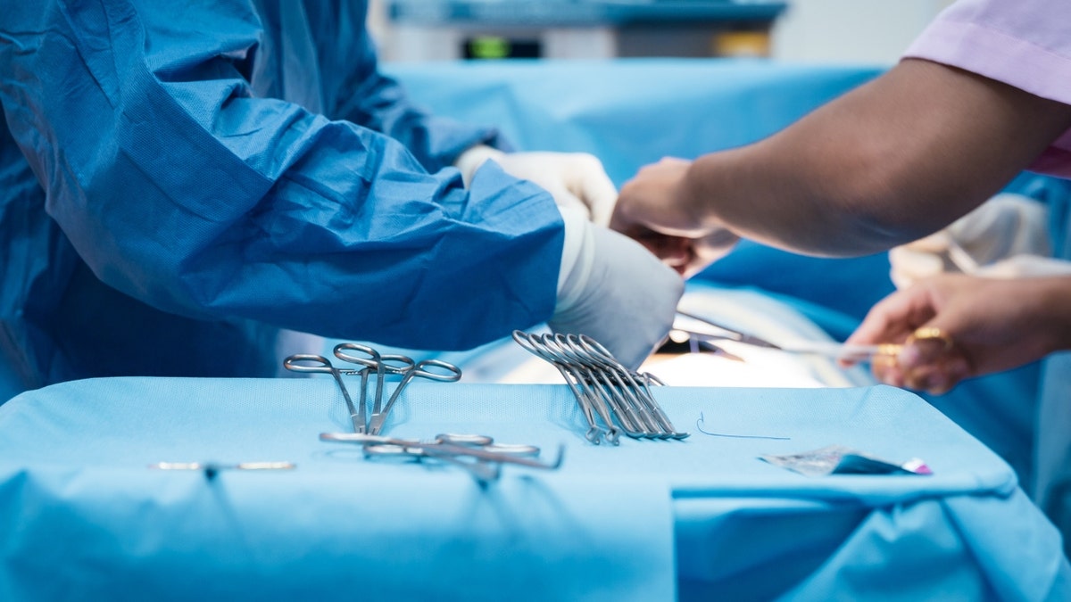 doctors operating on patient