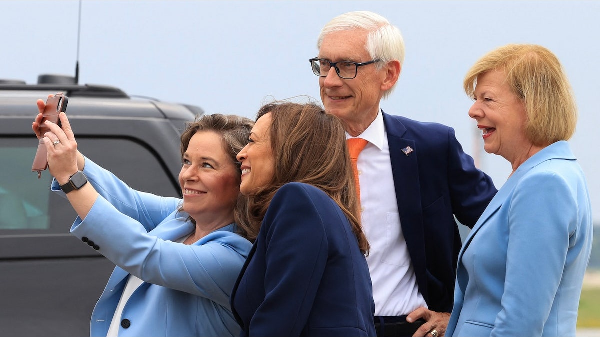 evers with Kamala Harris and Sen. tammy baldwin