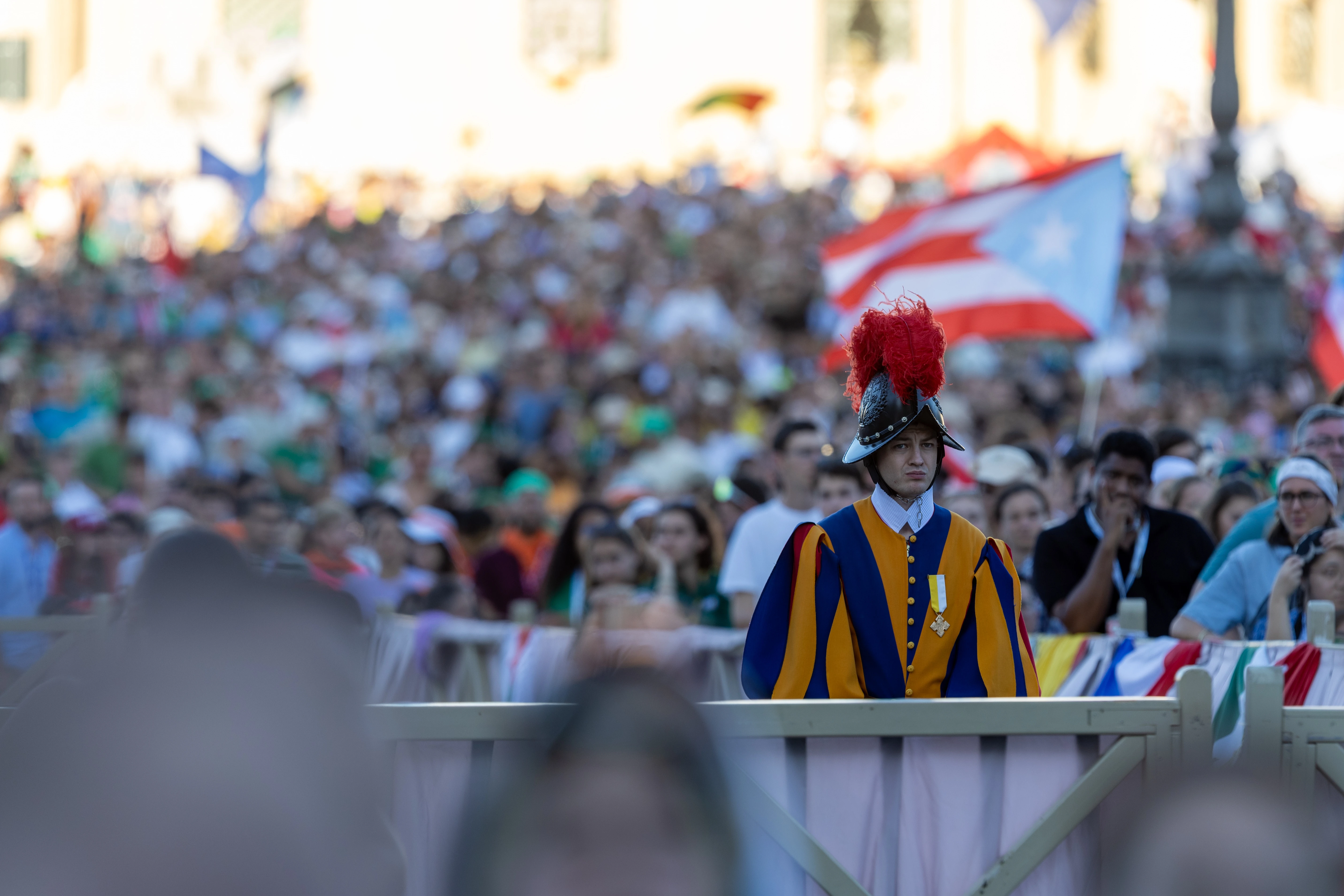 A Swiss Guard stands watch during the Jubilee of Youth welcome Mass on July 29, 2025, in St. Peter’s Square at the Vatican. Credit: Daniel Ibañez/CNA