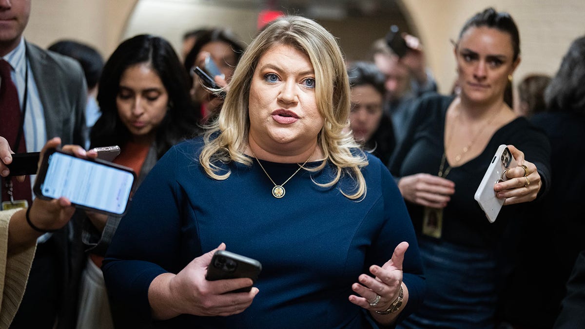Rep. Kat Cammack walks on Capitol Hill