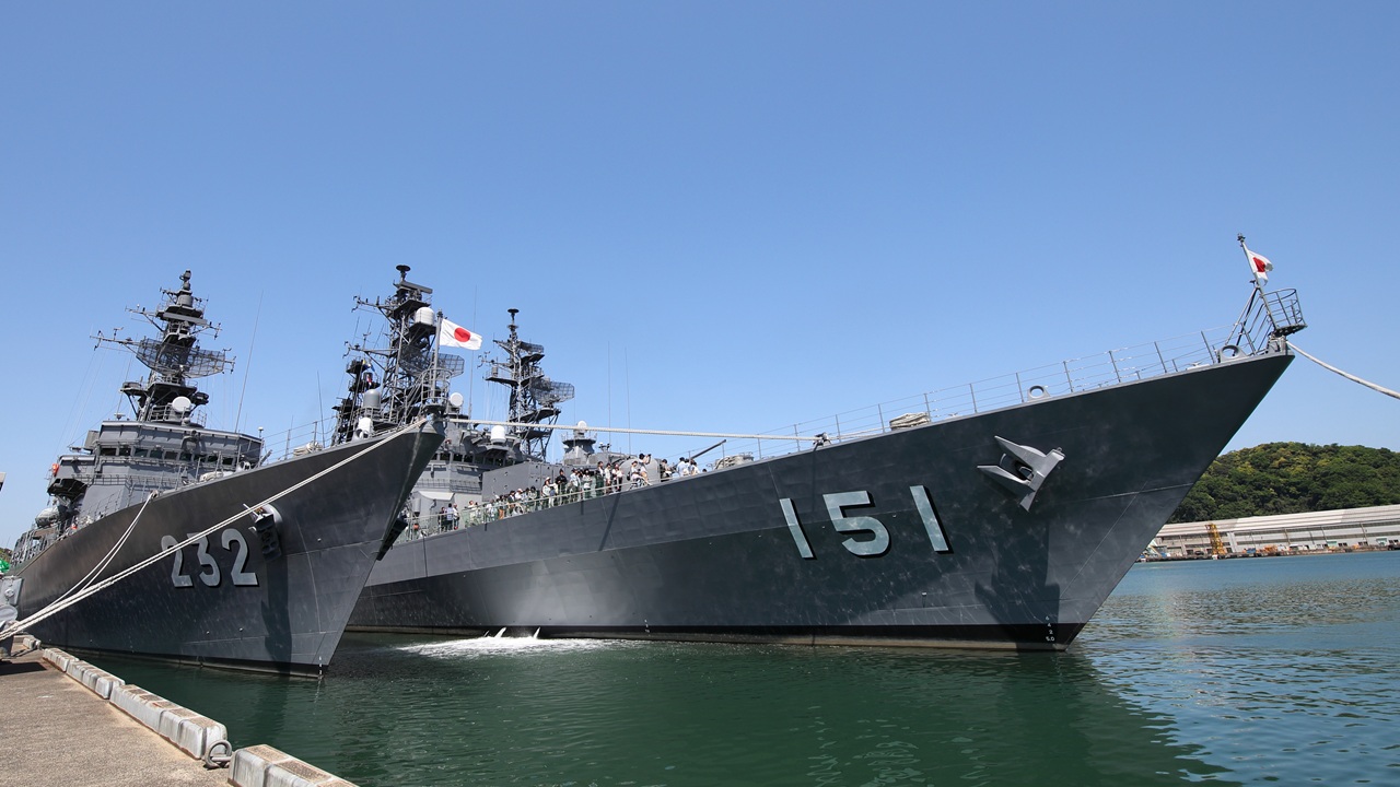 A Japanese warship in port.