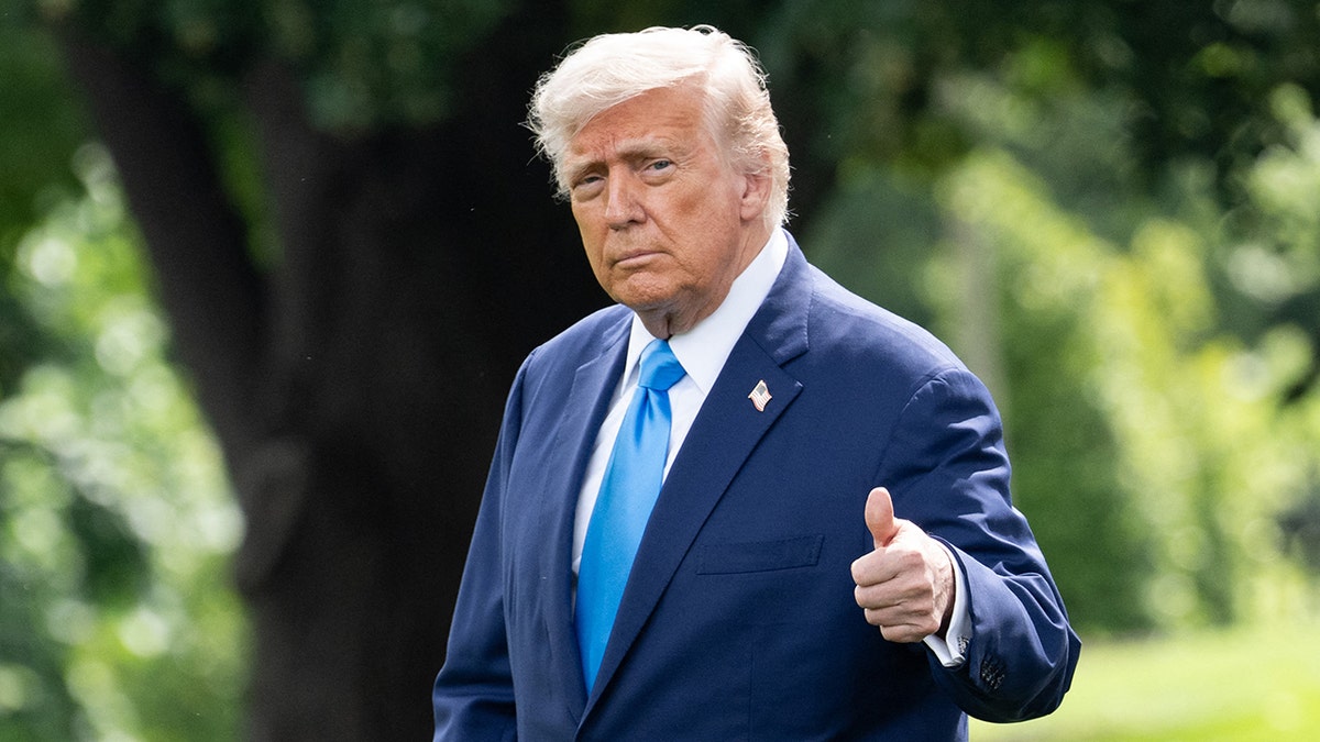 President Donald Trump gives the thumbs up
