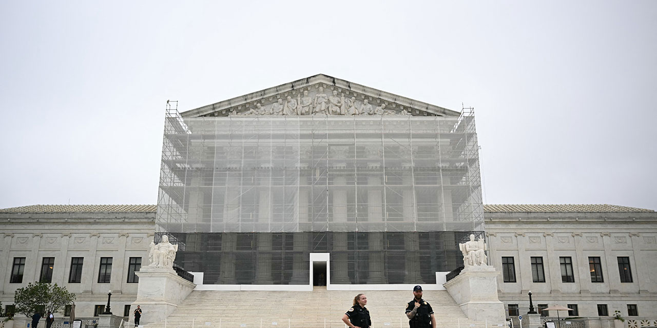 US Supreme Court Police officers stand outside the Supreme Court in Washington, DC, on June 27, 2025.