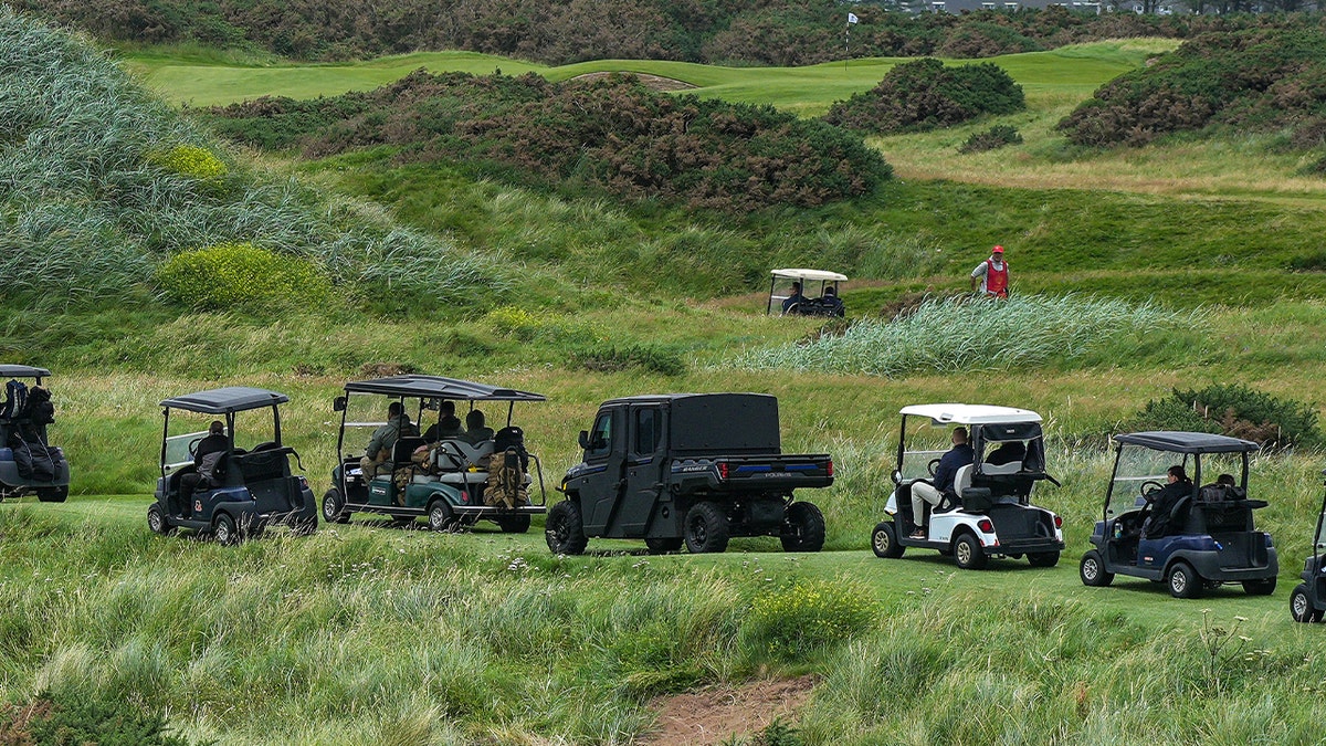 New armored vehicle deemed Golf Force One accompanies Trump on golf outing