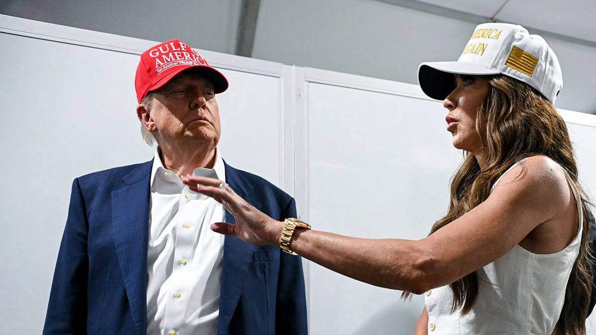 Trump with Noem closeup shot