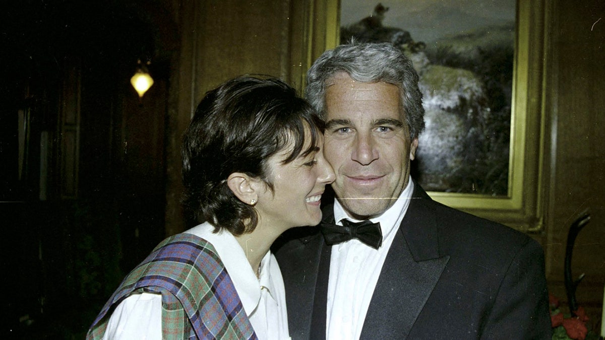 Ghislaine Maxwell and Jeffrey Epstein smiling