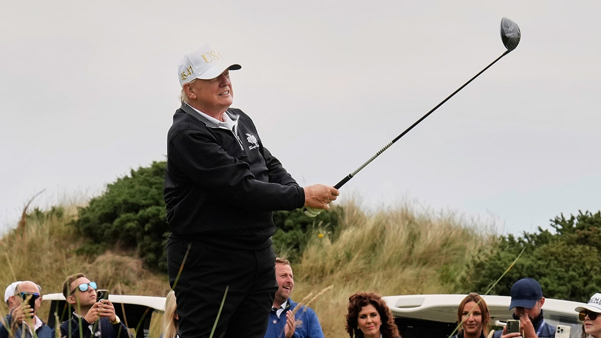Trump takes a golf swing in Aberdeen, Scotland