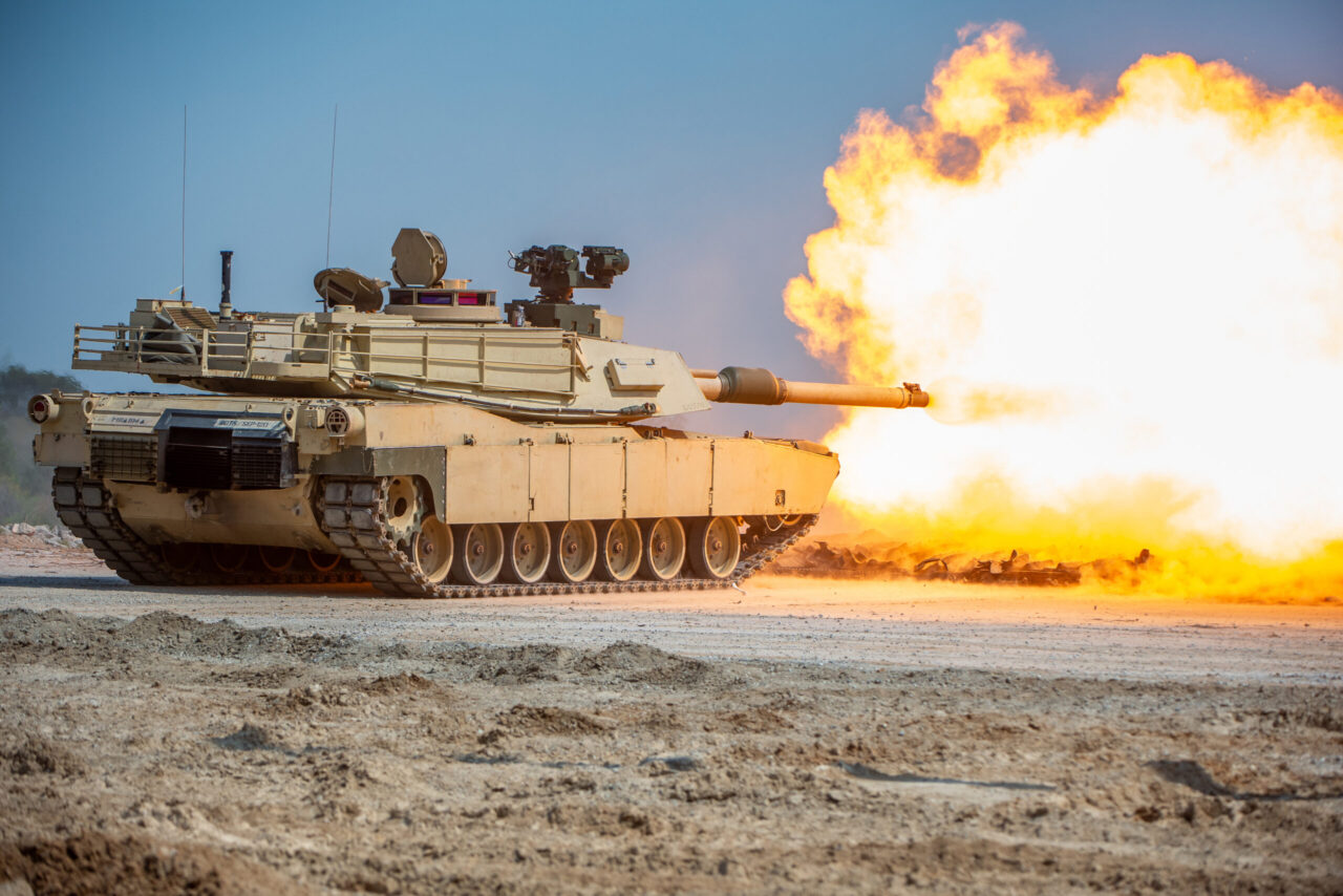 Soldiers from 1st Battalion, 81st Armor Regiment, 194th Armored Brigade fire an M1 Abrams main battle tank during the Maneuver Center of Excellence's Armor Week media preview day at Harmony Church on Fort Moore, Ga., March 14, 2024.