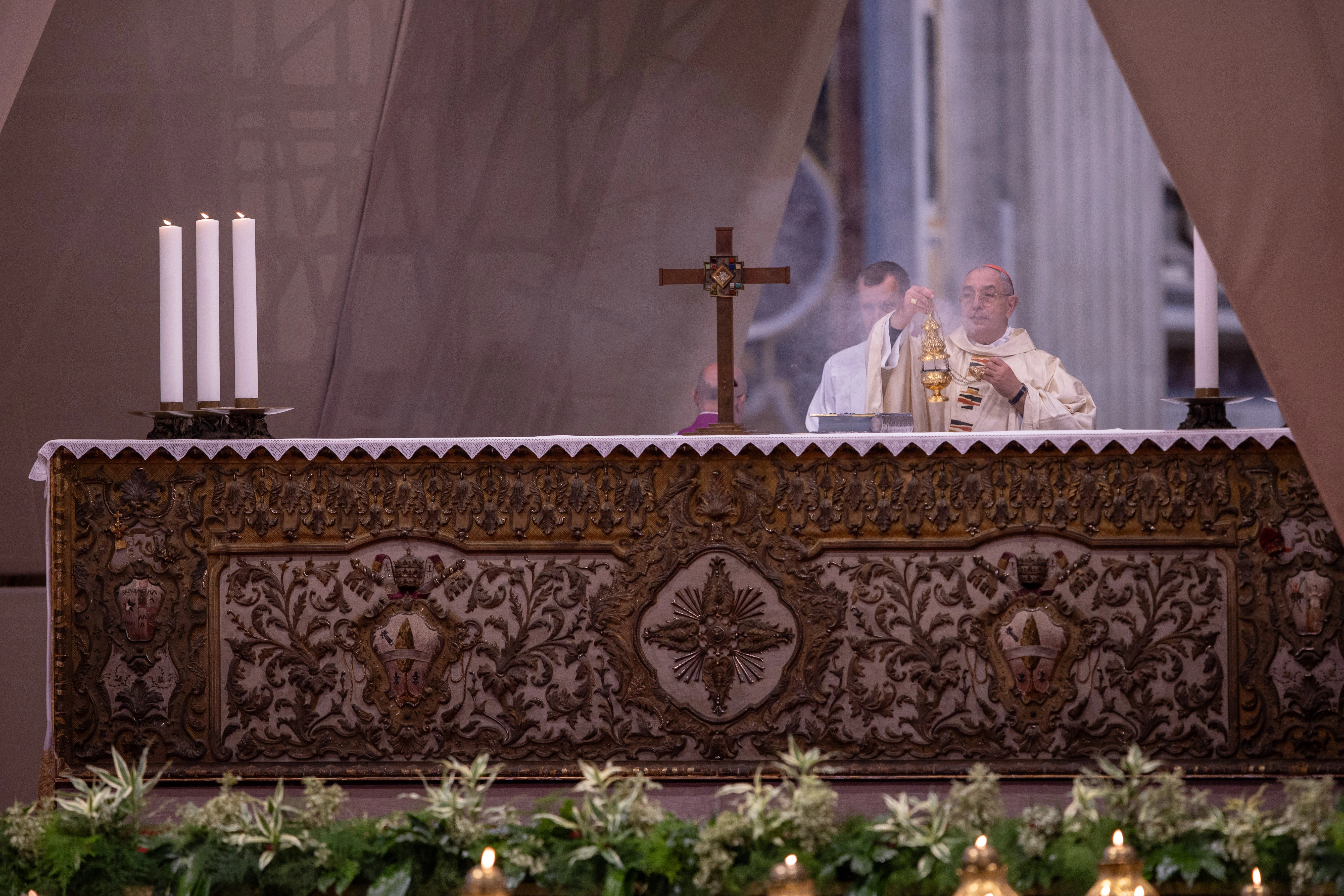 Cardinal Angelo De Donatis presides at the altar during the Vatican's chrism Mass on Holy Thursday, March 28, 2024. Credit: Daniel Ibanez/CNA