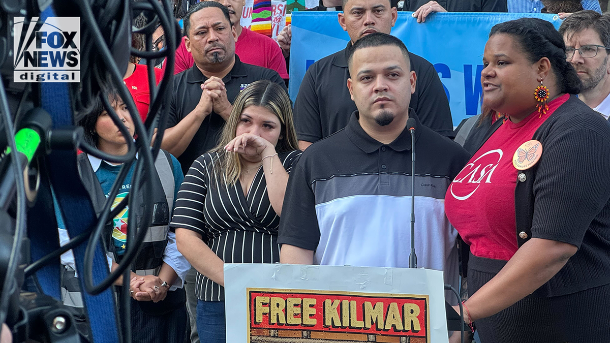 Kilmar Abrego Garica speaks at podium