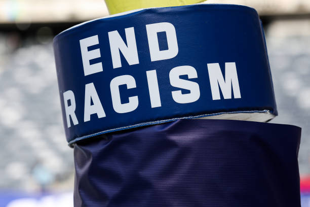 Detail view End Racism goal post pad prior to a game between the Carolina Panthers and the New York Giants at MetLife Stadium on Friday, August 18 in...