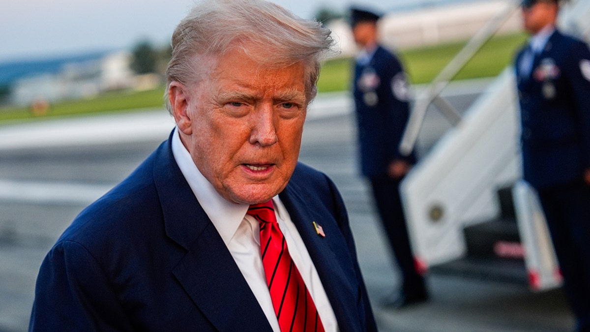 Trump looks stern while answering reporter questions in Pennsylvania