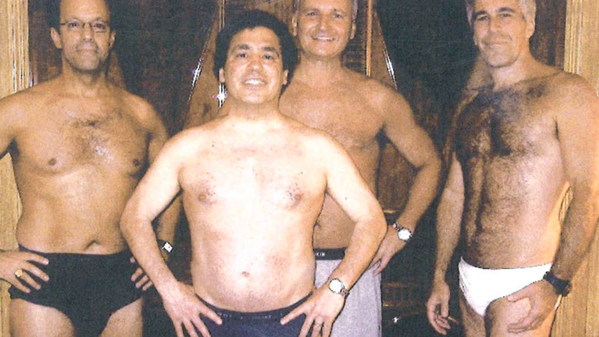 Epstein standing with male friends in underwear