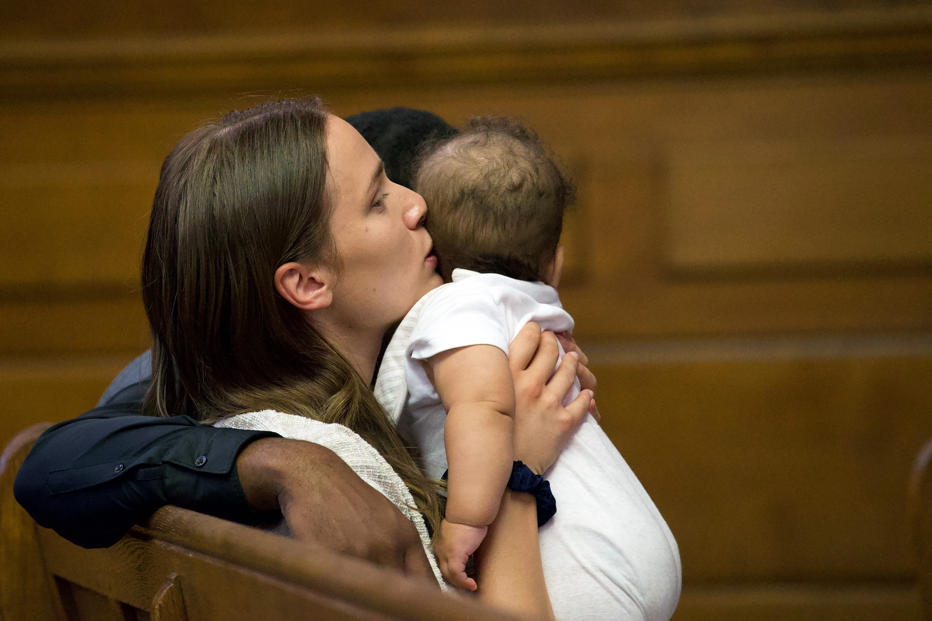Natalia, a young mother who shared her story of abortion and healing, attends a pre-march event with her child. Credit: Edward Pentin/EWTN News