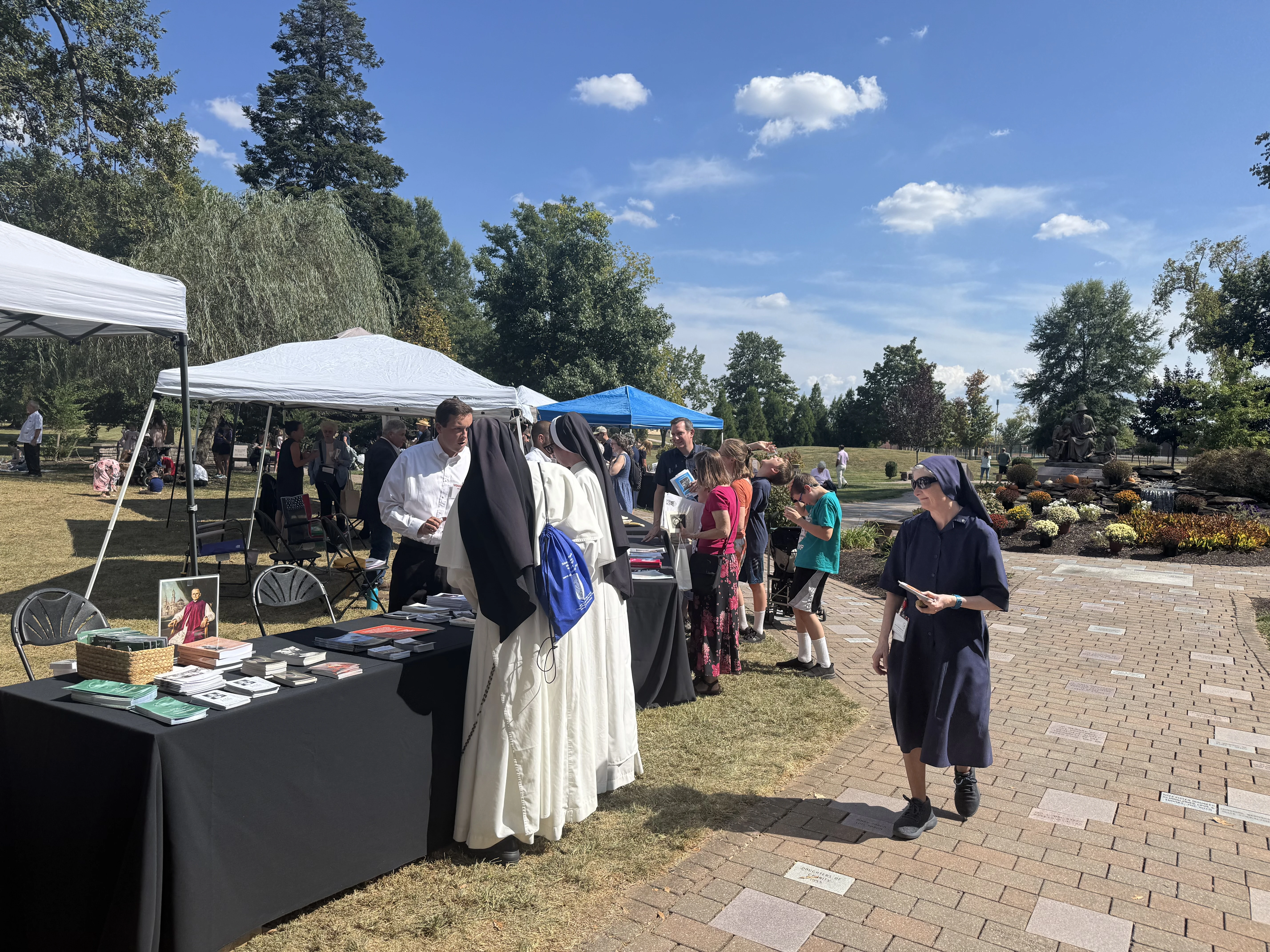 Dominican nuns walk around the "Saints on Their Way Village" at the National Shrine of Saint Elizabeth Ann Seton to learn more about potential American saints. Credit: Tessa Gervasini/CNA