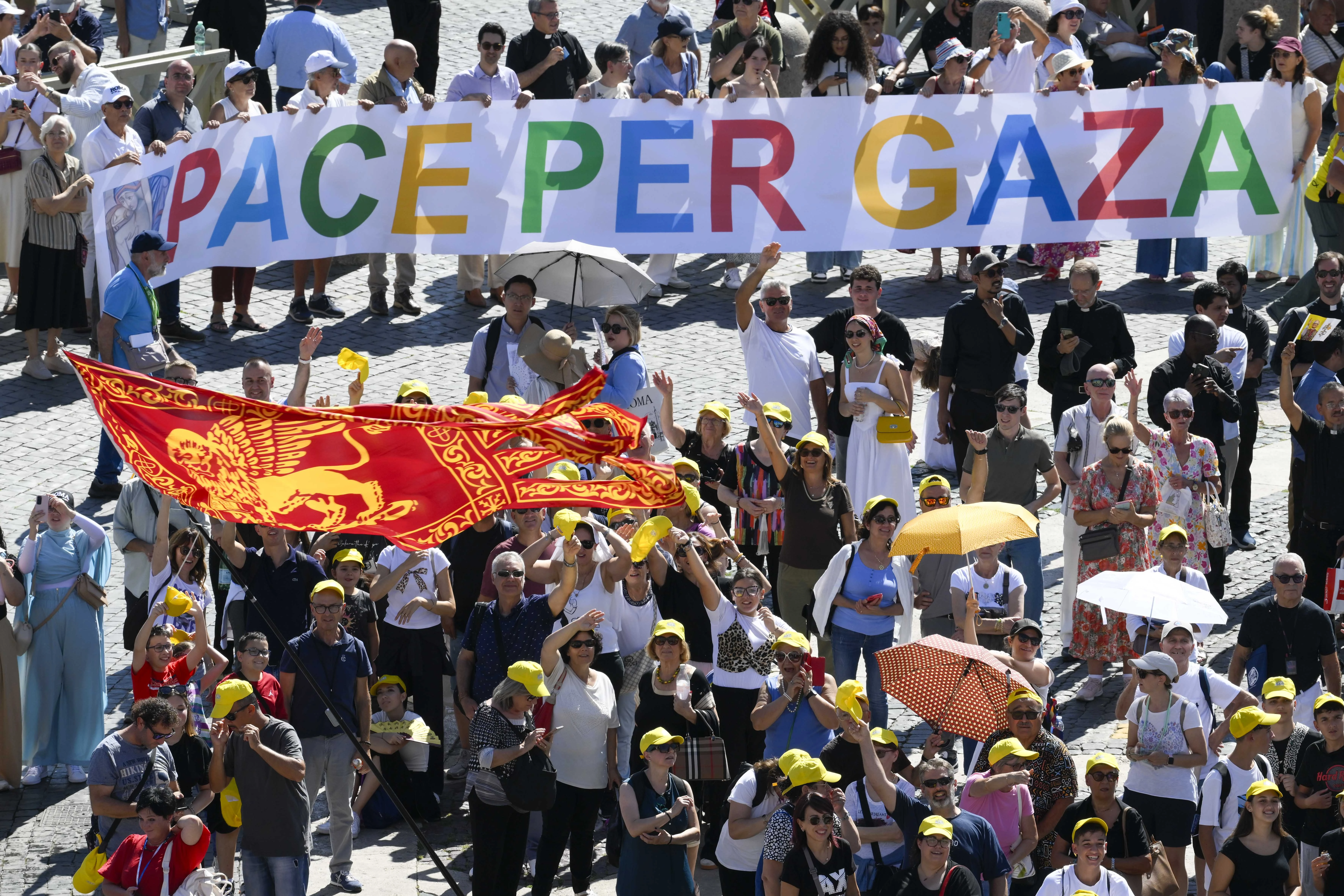 Pilgrims hold a sign reading, "Peace for Gaza," during the Angelus of Sept. 21, 2025, in St. Peter's Square. Credit: Vatican Media.