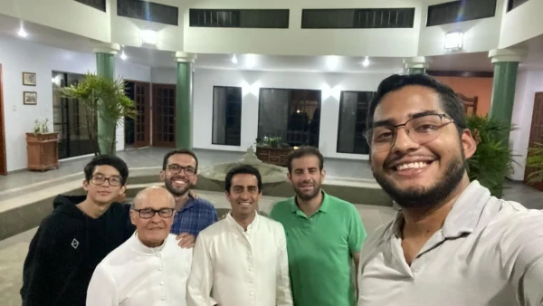Father José Giner with a group of young men. Credit: Father José Giner