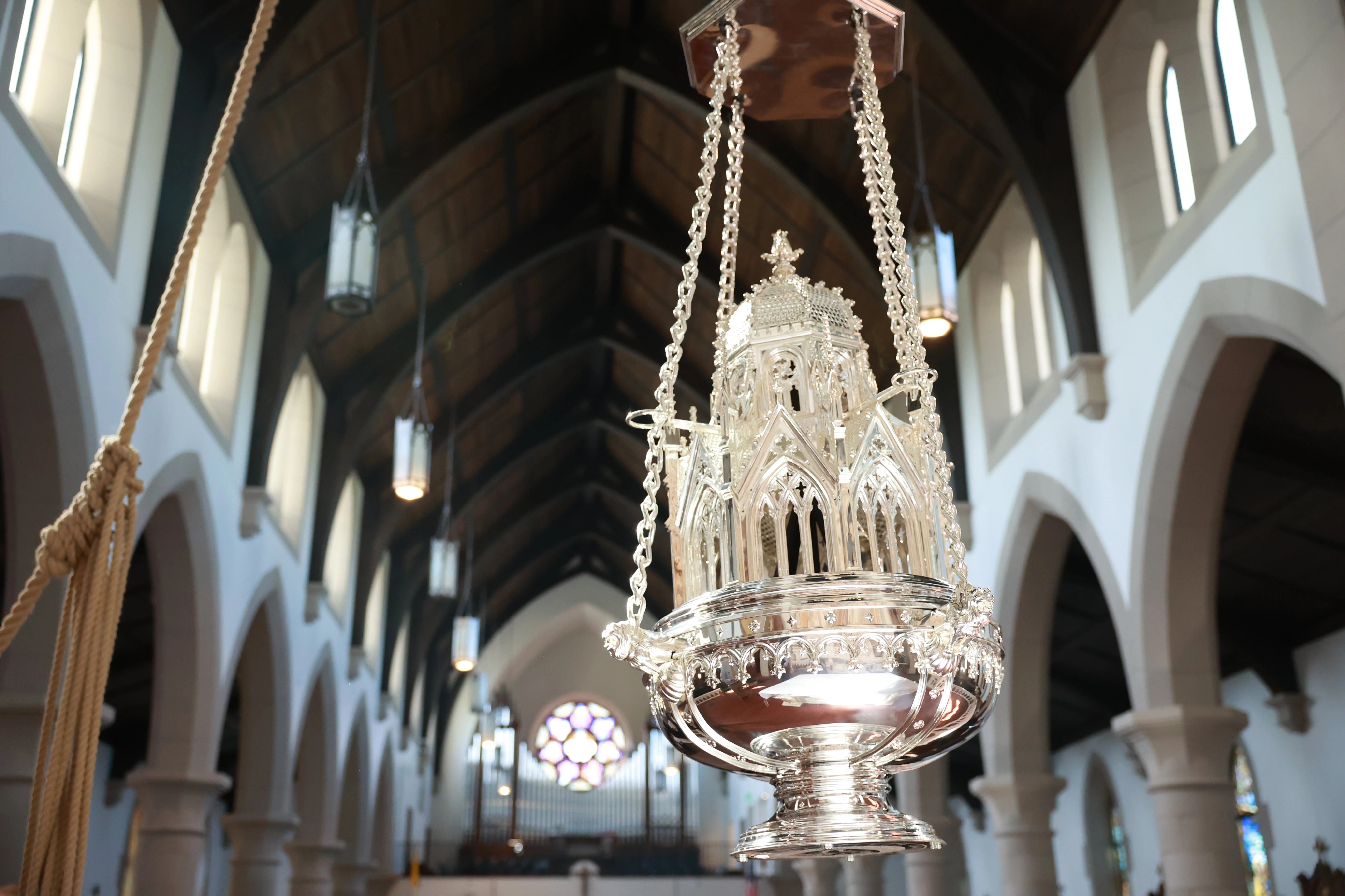 On feast days of the Church, Christendom's thurible is brought near the central altar where it is hoisted on chains and swung by senior students. Credit: Courtesy of Christendom College