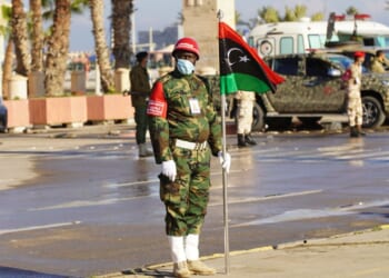 Libyan guard stands at attention in Tripoli, Libya.