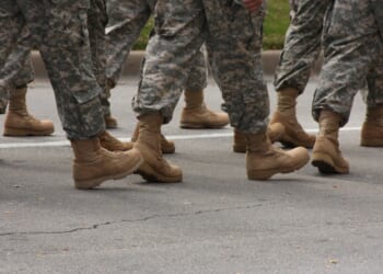 A group of soldiers marching.