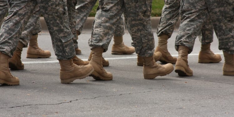 A group of soldiers marching.