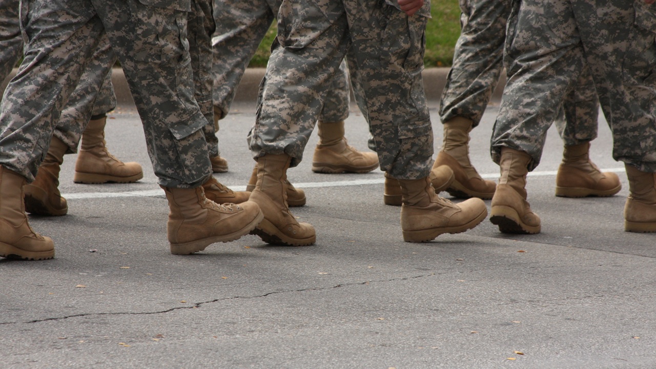 A group of soldiers marching.