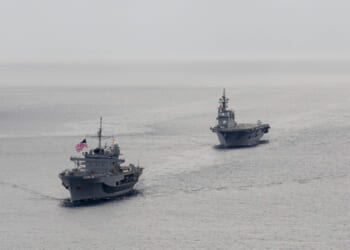 The Japan Maritime Self-Defense Force Hyuga-class helicopter destroyer JS Hyuga (DDH 181) sails in formation with U.S. 7th Fleet flagship USS Blue Ridge (LCC 19) in support of Exercise Freedom Edge 25 in the U.S. 7th Fleet area of operations, Sept. 16, 2025.