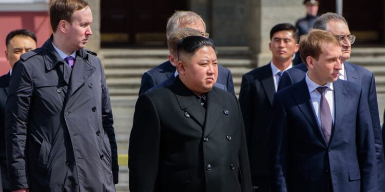 Kim Jong-un with Russian officials.