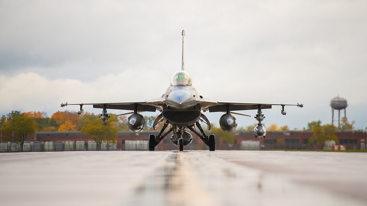 An F-16 Fighting Falcon on a runway.