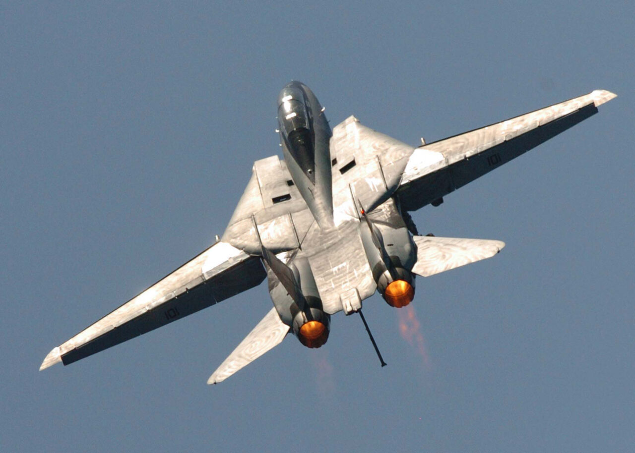 An F-14D Tomcat pulls up after performing a fly-by past the aircraft carrier USS Dwight D. Eisenhower (CVN 69) as the ship operates in the Atlantic Ocean on June 19, 2006.