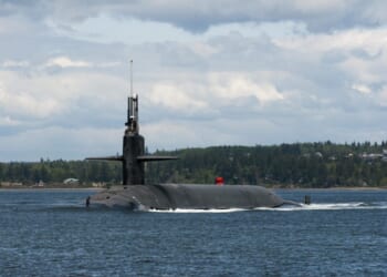 The Gold Crew of the Ohio-class ballistic-missile submarine USS Alabama (SSBN 731) transits the Hood Canal as the boat returns home to Naval Base Kitsap-Bangor following a routine strategic deterrent patrol.