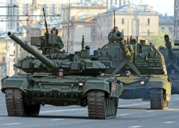 Russian army main battle tank T-90A moving along the Sadovoe koltso street in Moscow to the Great Victory parade rehearsal.