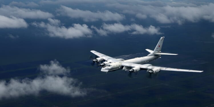 A Russian Tu-95 "Bear" bomber in flight.