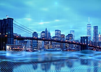 High speed telecommunications connection, smart city and data transmission technology concept with blue digital waves imitating wires on Brooklyn bridge and New York city background, double exposure