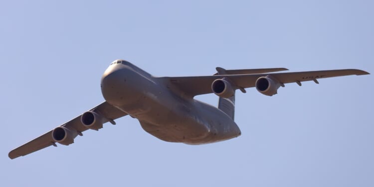 A C-5 Galaxy cargo aircraft in flight.